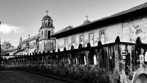 Low angle view of historic church and monastery building at patzcuaro against sky