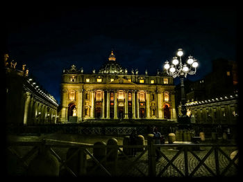 Illuminated building at night