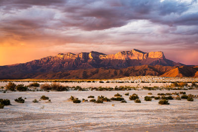 Scenic view of mountain against sky during sunset