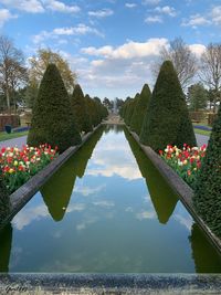 Scenic view of lake against sky seen from swimming pool