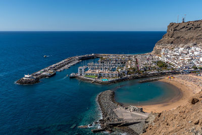 High angle view of beach against blue sky