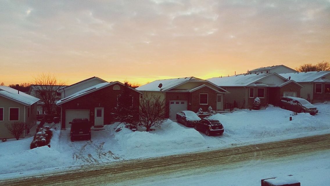 HOUSES IN WINTER DURING SUNSET