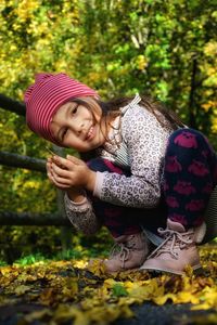 Portrait of cute girl wearing hat