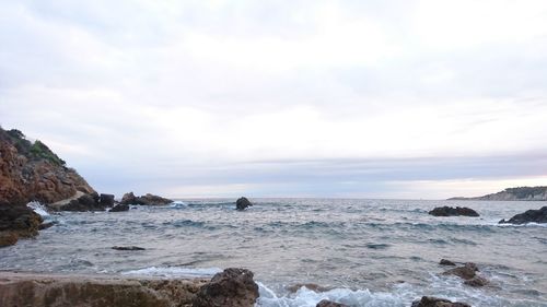 Scenic view of sea and cloudy sky