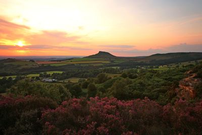 Scenic view of landscape against sky during sunset