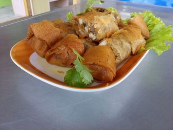 Close-up of served food in plate