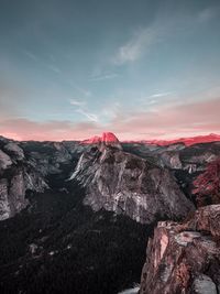 Scenic view of mountains against sky during sunset