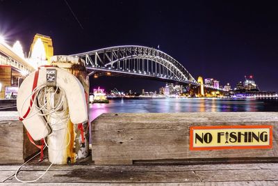 Bridge over river at night