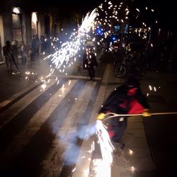 Crowd in city at night