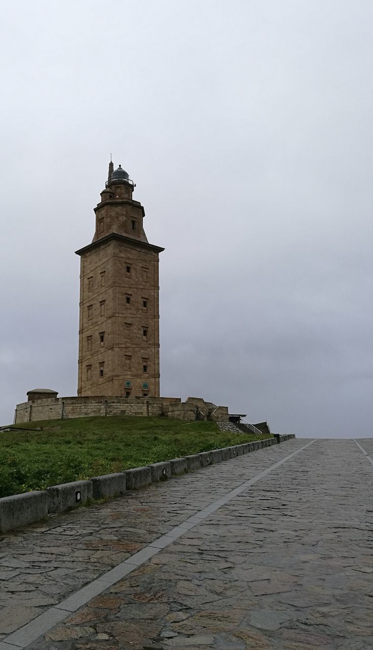 VIEW OF TOWER AGAINST SEA