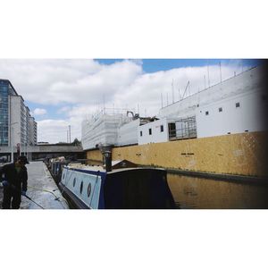 Buildings in city against sky