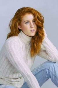 Portrait of young redhead woman