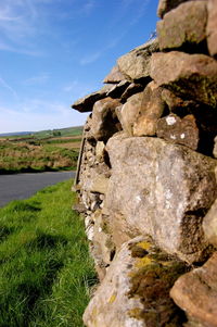 Rocks on land against sky