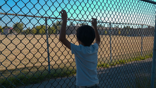 Chainlink fence against sky