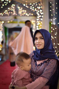 Portrait of mother with daughter