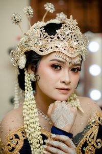 Portrait of young woman wearing traditional clothing