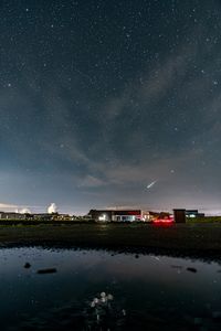 Scenic view of sea against sky at night