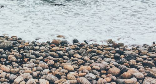 Close-up of pebbles on beach