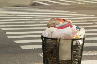 High angle view of garbage bin on road