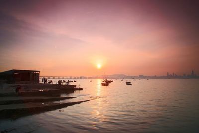 Scenic view of sea at sunset