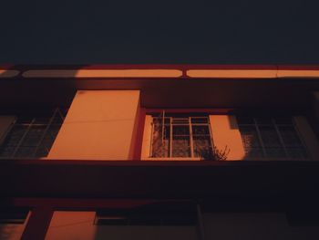 Low angle view of building against sky at night