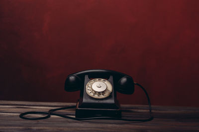 Vintage telephone on table