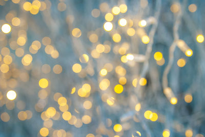 Defocused image of illuminated lights at night