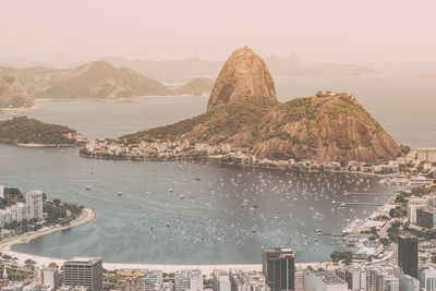 Panoramic view of sea against mountain range