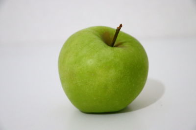 Close-up of apple against white background