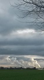 Scenic view of landscape against cloudy sky