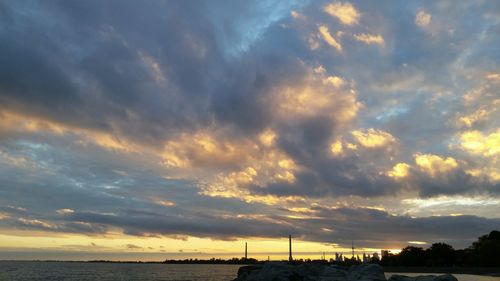 Scenic view of sea against dramatic sky