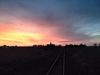 Railroad track at sunset