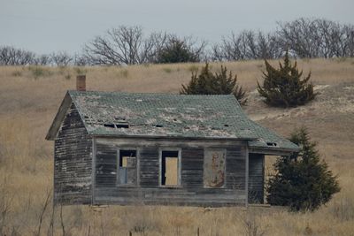 Abandoned house against clear sky