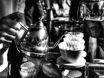 Close-up of hand holding drink
