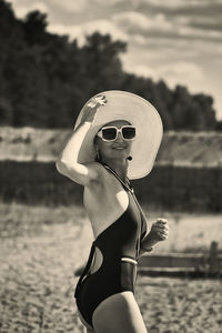 Young woman wearing hat