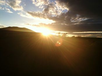 Scenic view of silhouette landscape against sky during sunset