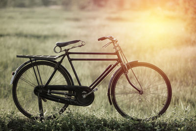 Bicycle parked on field