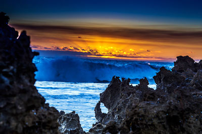 Scenic view of sea against sky during sunset