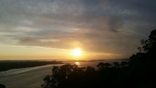 Scenic view of sunset over sea