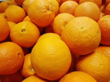 Full frame shot of oranges in market