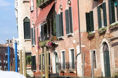 Buildings by street in city