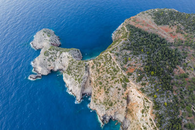 High angle view of rock formation in sea