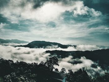 Low angle view of silhouette mountain against sky