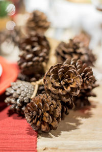 Close-up of pine cone on table