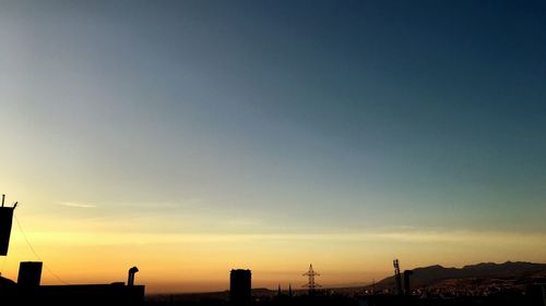 Silhouette of buildings at sunset