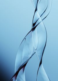 Close-up of white reflection against clear blue sky