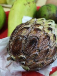 Close-up of sliced fruit on table