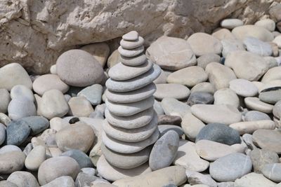 Close-up of stack of pebbles on rocks