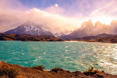 Scenic view of snowcapped mountains against sky during winter