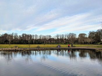 Scenic view of pond against sky